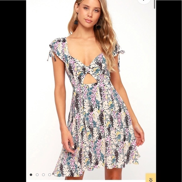 Free People Dresses & Skirts - - NWT Free People Cream Miss Right Floral Print Mini Dress